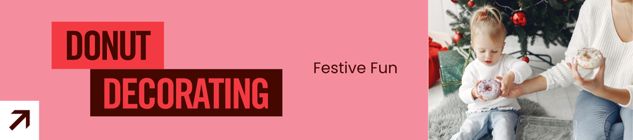 little girl holding a donut