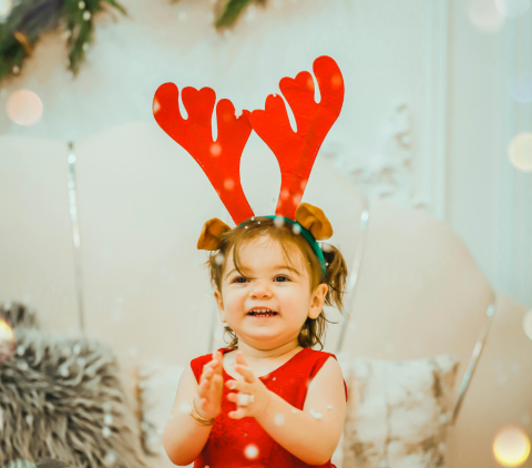 Little girl with reindeer ears