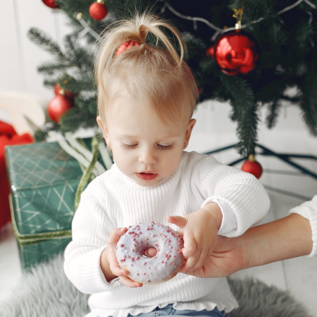 Child holding donut