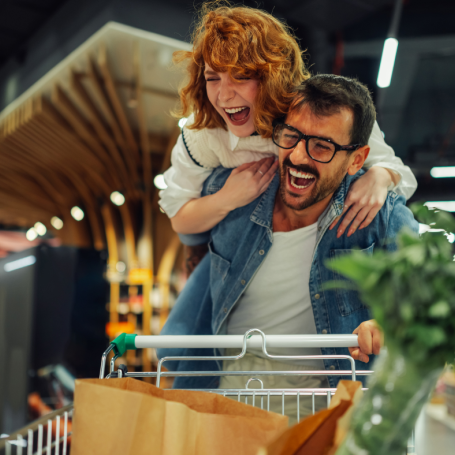 Man and woman with shopping trolley