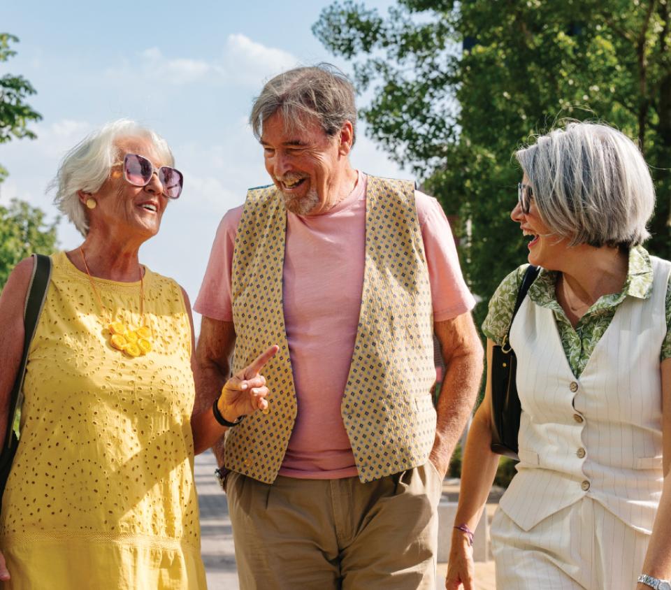 a group of 3 seniors, laughing